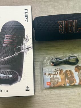 JBL Portable Bluetooth Speaker in Black with Orange Logo